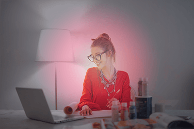 woman-in-red-long-sleeve-shirt-looking-at-her-laptop-A-business-or-a-hobby